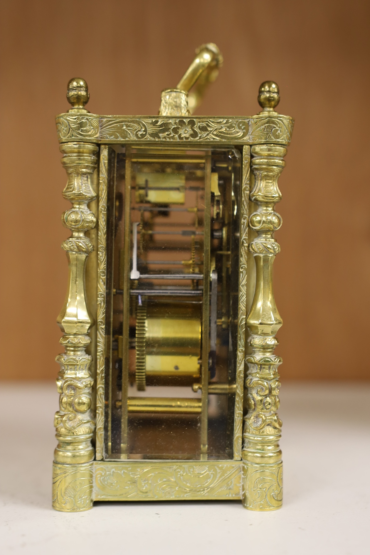 A repeating carriage clock by Auguste, Paris (missing bell), 13.5cm including handle. Condition - case and glass fair, untested if working